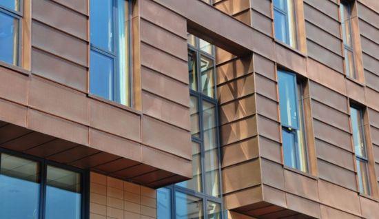 Budynki zrobione z blachy Tecu® Bronze